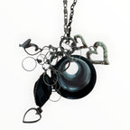 SILVER AND BLACK CHARMS NECKLACE